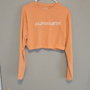 Alphalete Women's Long Sleeve Tee in Orange